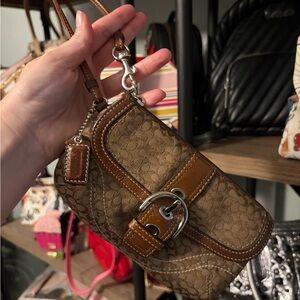 Coach soho Brown Signature Canvas Wristlet with Leather Buckle Accent